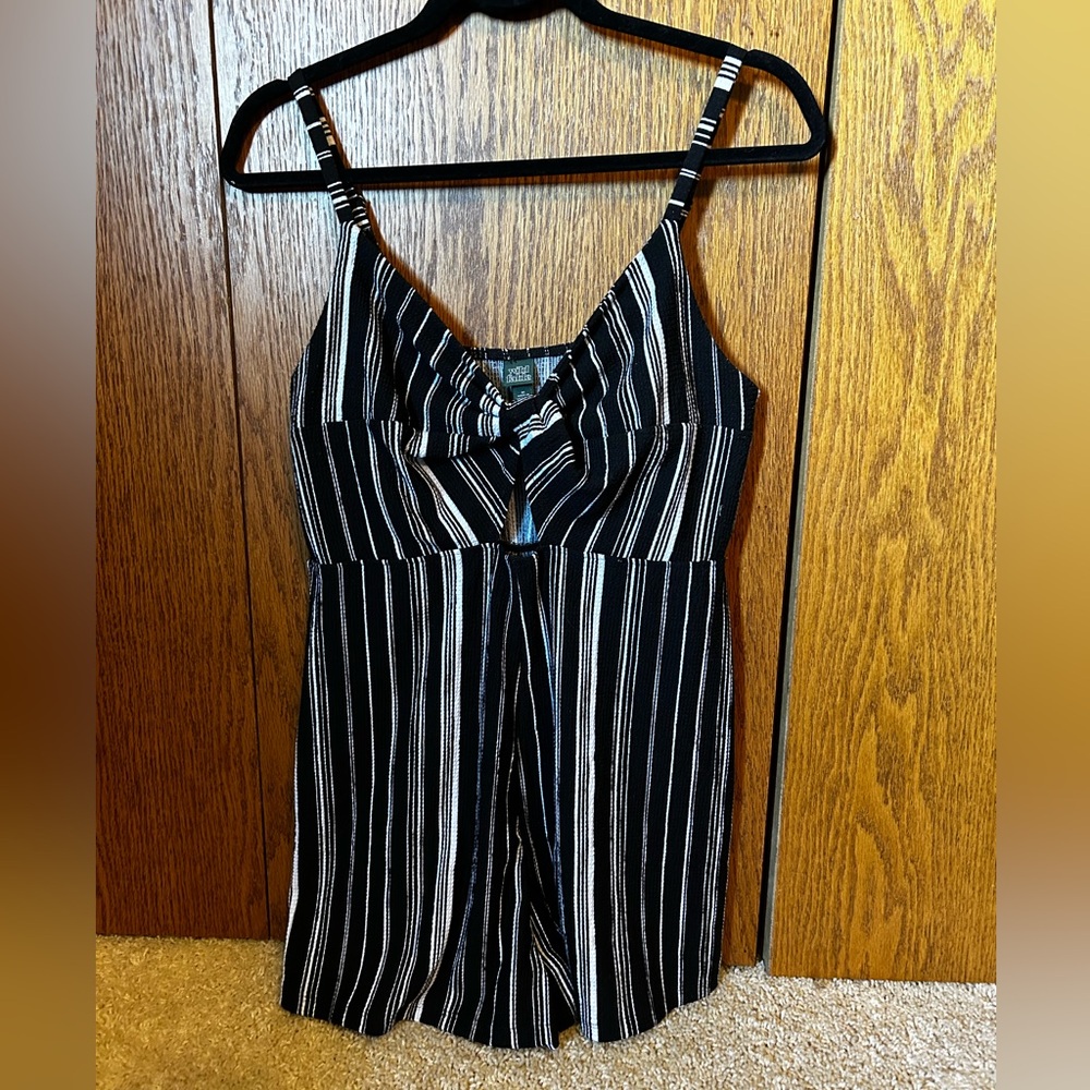 White and black stripped romper size medium.